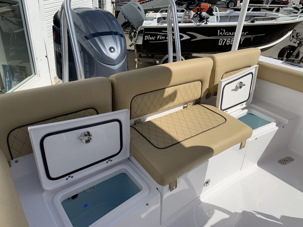 The stern is well appointed with additional comfortable seating and loads of storage underneath.